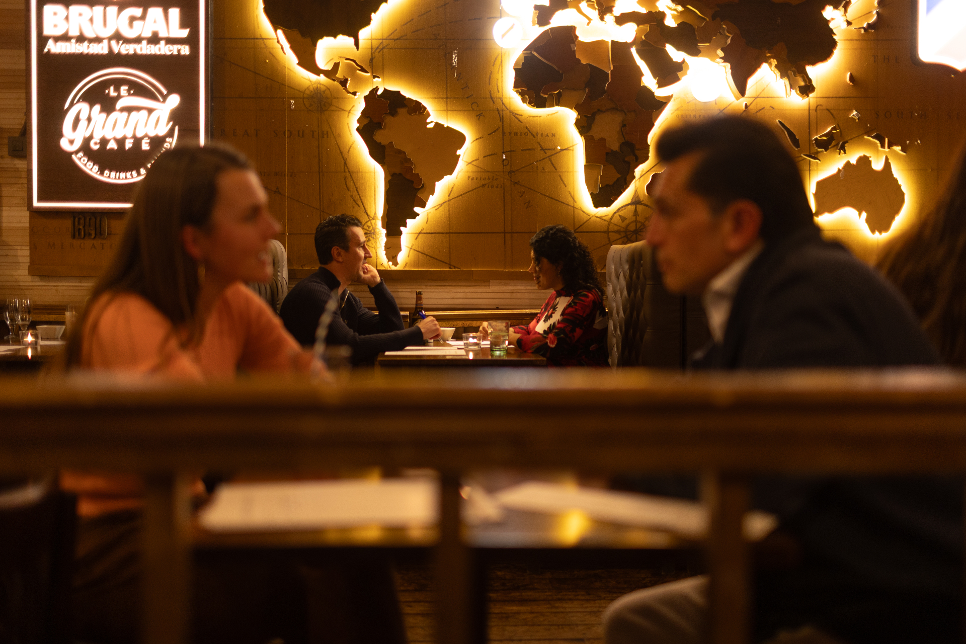Two people in calm conversation at golden hour